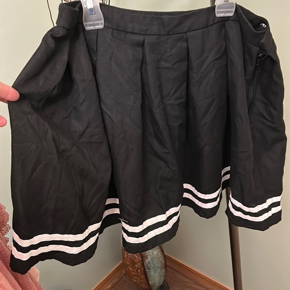 Hot topic black skirt XL with white decorative trim.